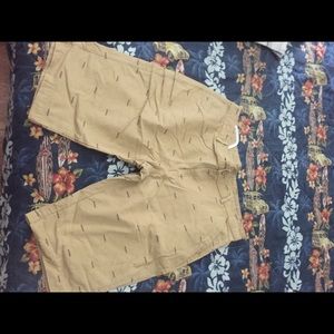 Reverb tan flat Front Shorts With fish bones